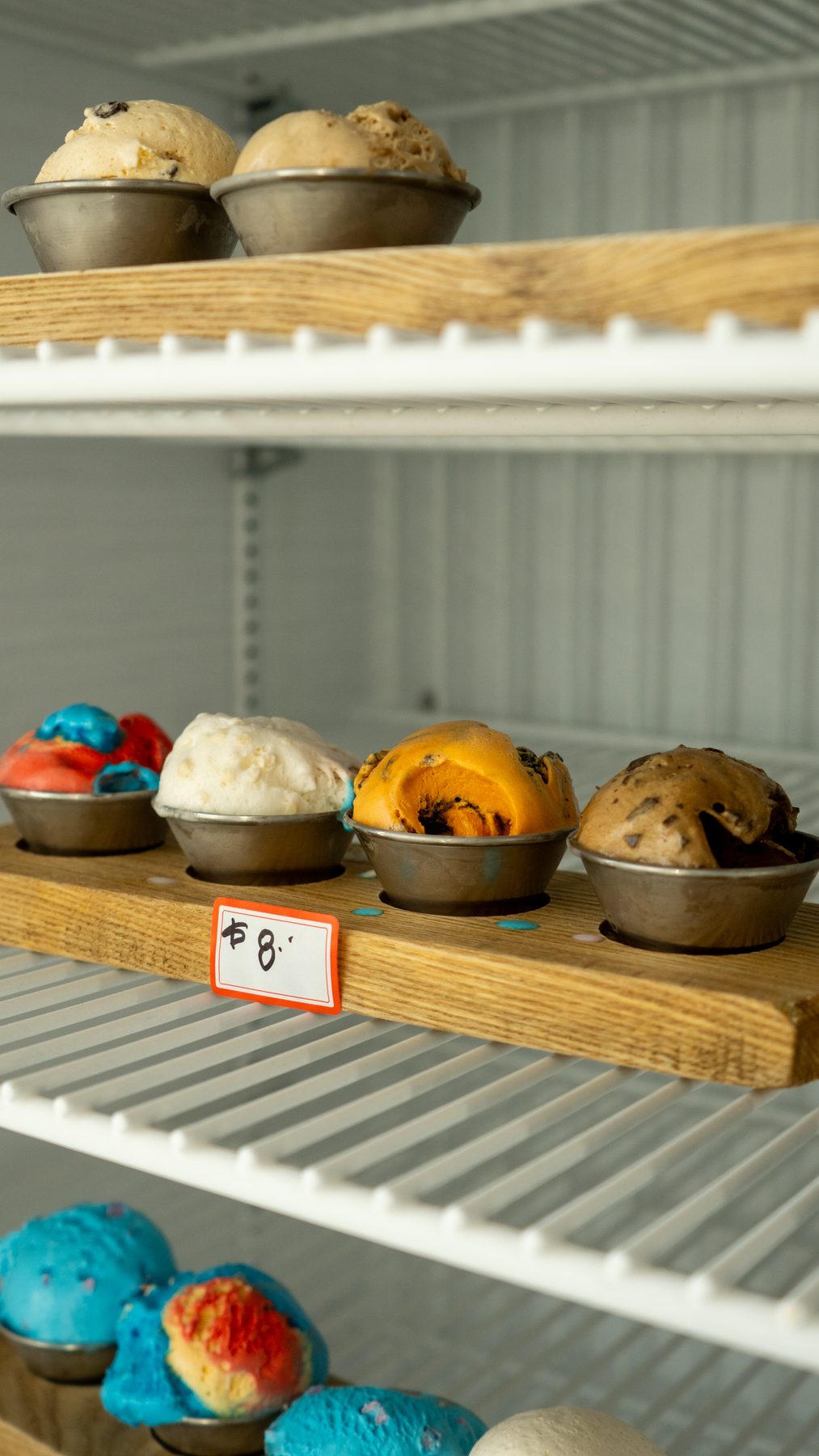 Pastries and donuts in a bakery display case